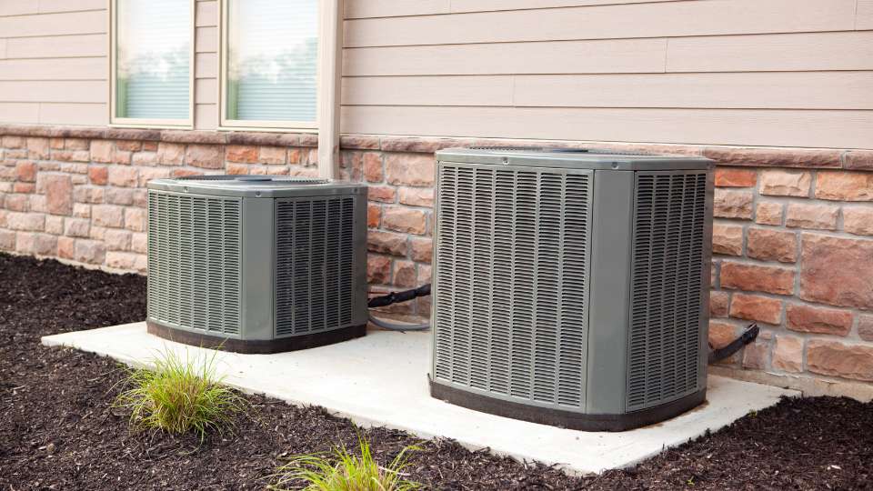 two air conditioners outside home in St Pete FL